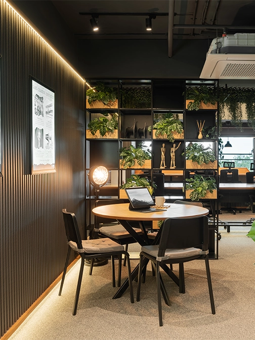 A working manufacturing corporate floor — open-plan functional zones positioned for cross-functional coordination