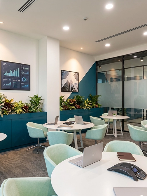 A considered financial-services workspace — biophilic detailing, controlled visitor sequence, disciplined finish allocation